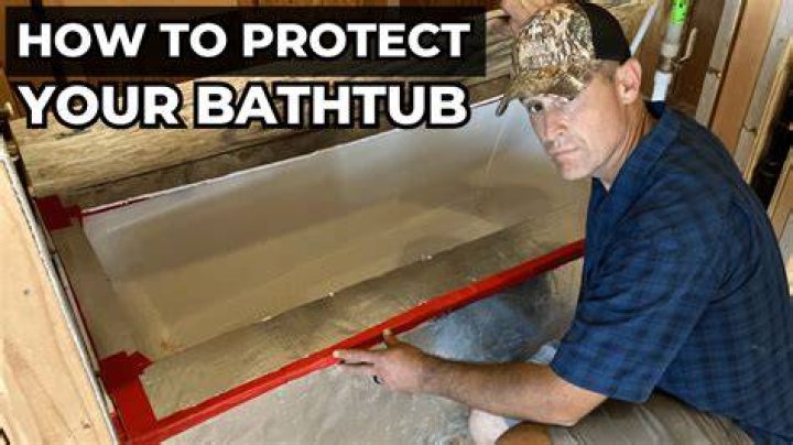 How do I protect my bathtub during construction?