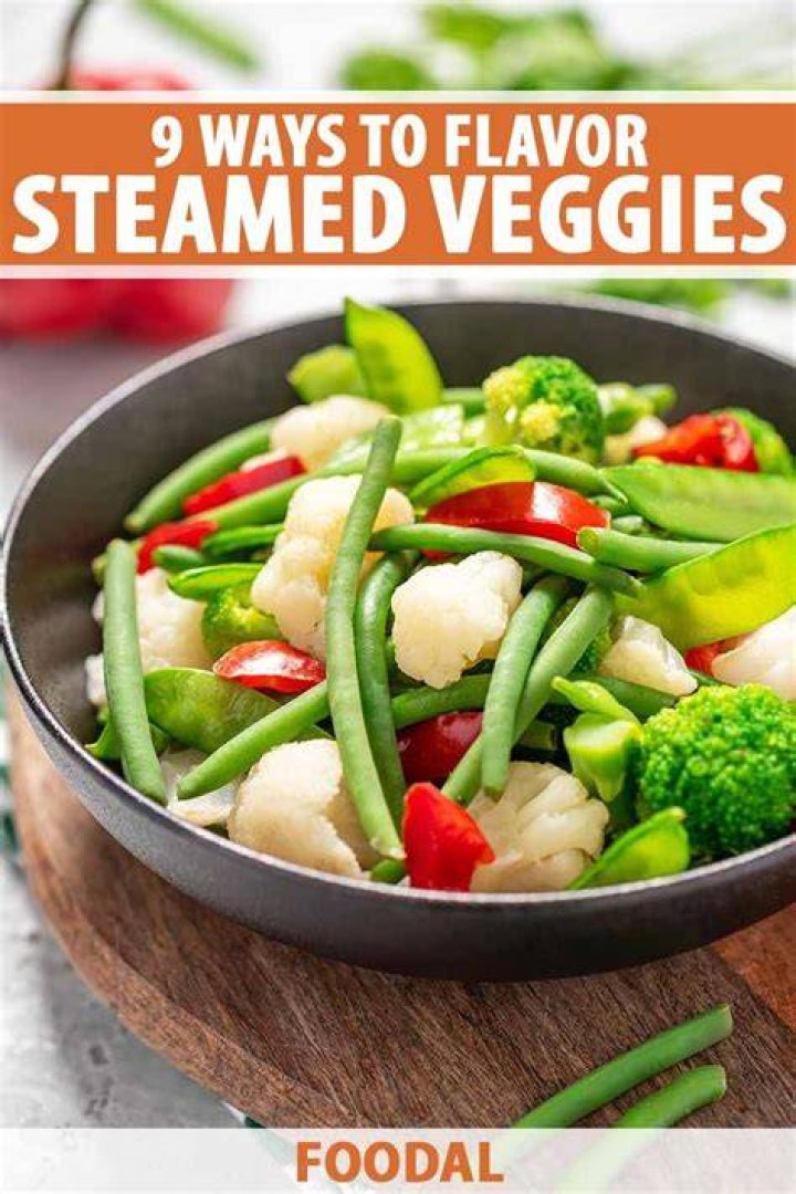 How do you add flavor to steamed vegetables?