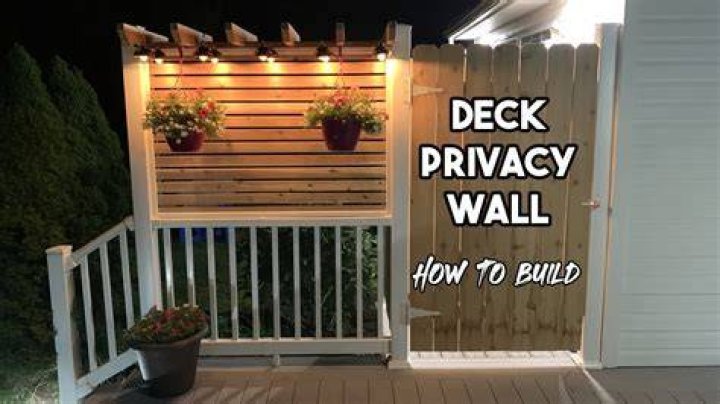 How do you install a privacy wall on a deck?